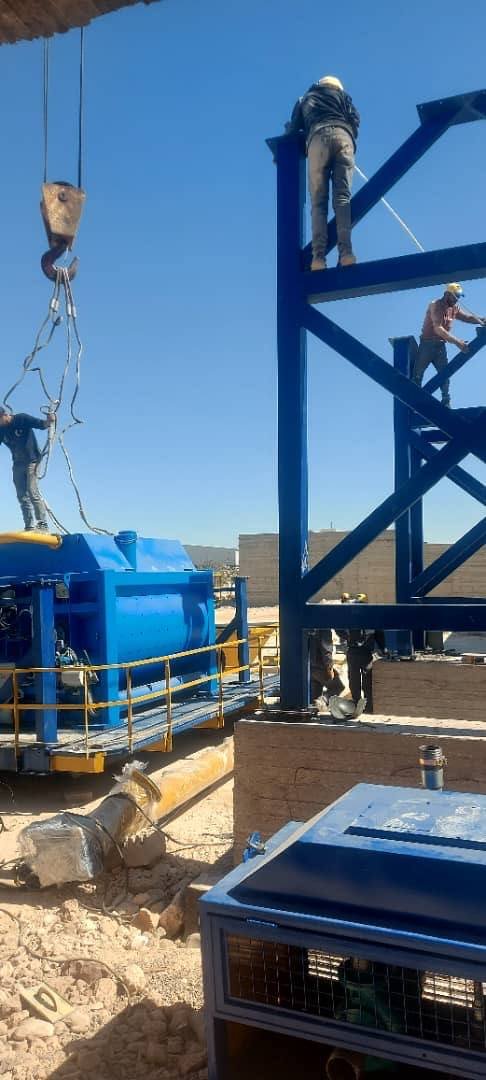 Workers performing structural steel work